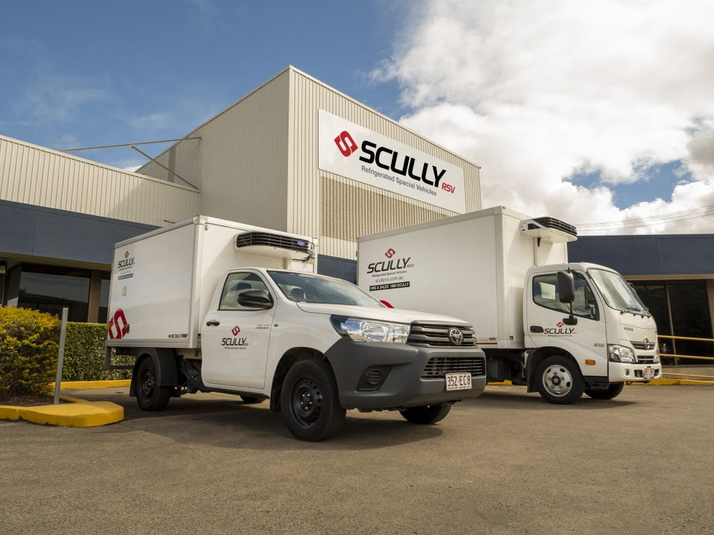 Two Scully RSV vehicles are shown parked outside of the Scully RSV headquarters in Brisbane.
