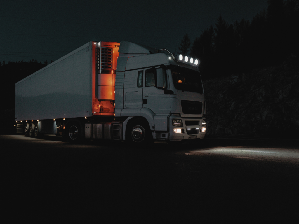 Refrigerated truck on a quiet night-time road