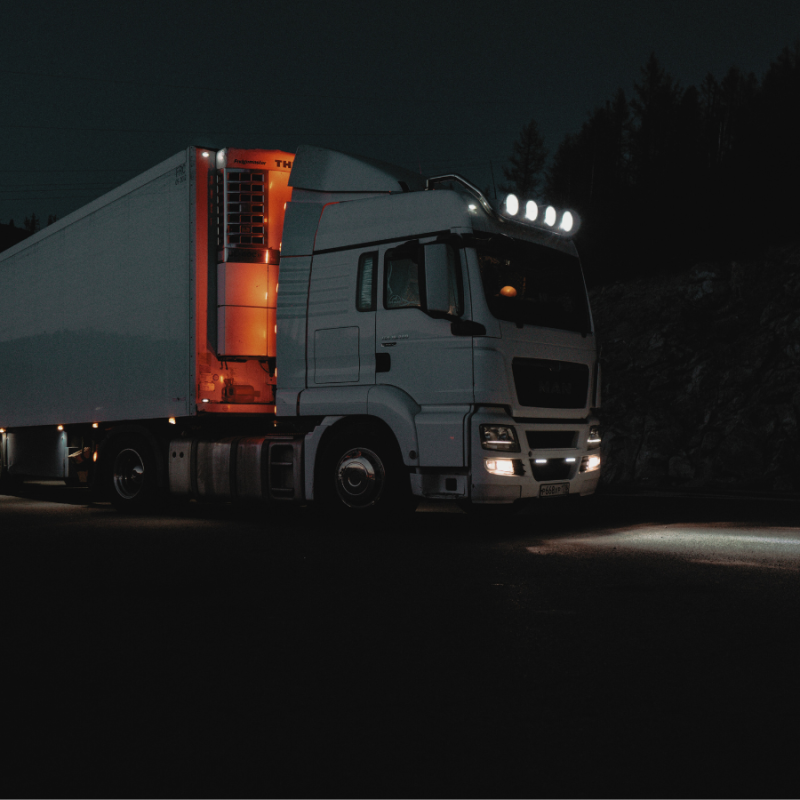 Refrigerated truck on a quiet night-time road